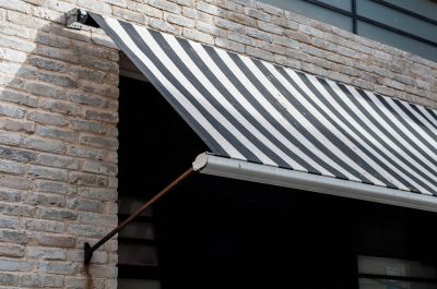 Protect Yourself From The Sun and Elements By Getting Your Retractable Awning Professionally Repaired
